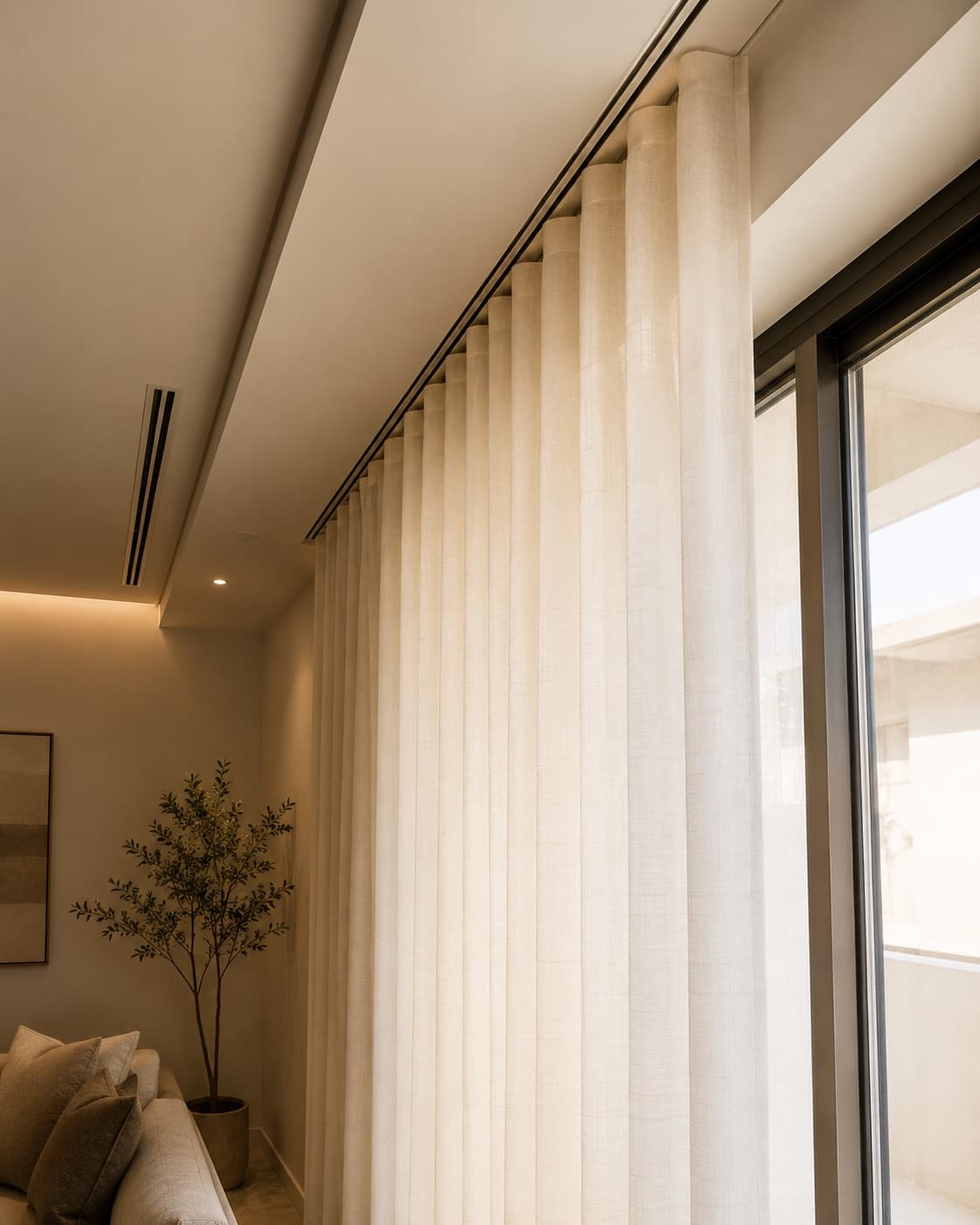 Townhouse window wall on a motorised track, dressed full height
